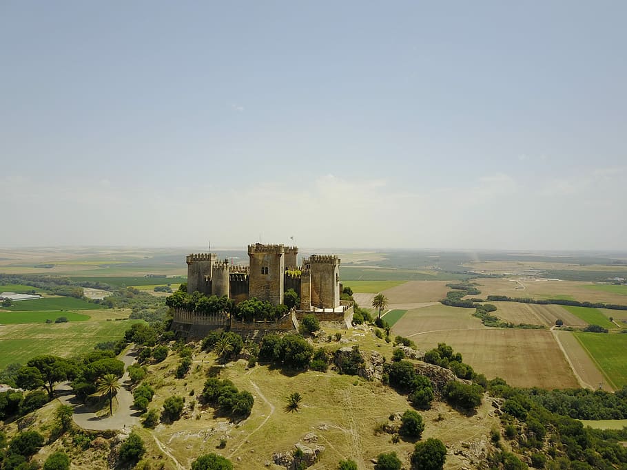 Castle on hilltop in the countryside - Spain, castle under sunny sky HD wallpaper