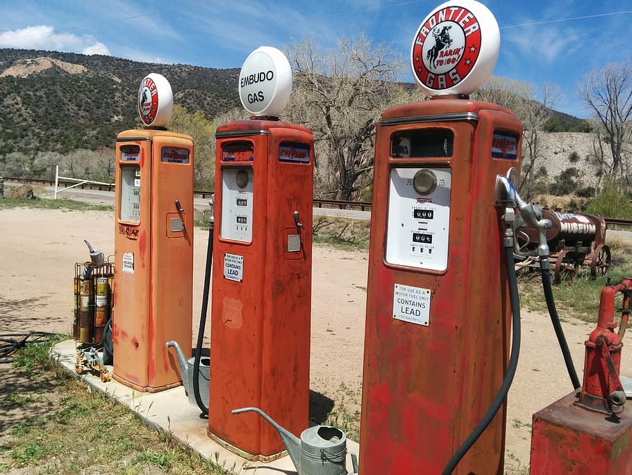three orange gas stations, filling station, gas pumps, vintage