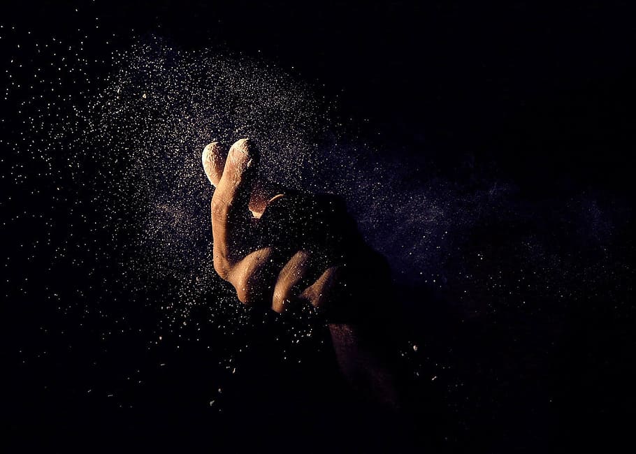 person's hand doing snap sign, human, painting, dark, night, sand