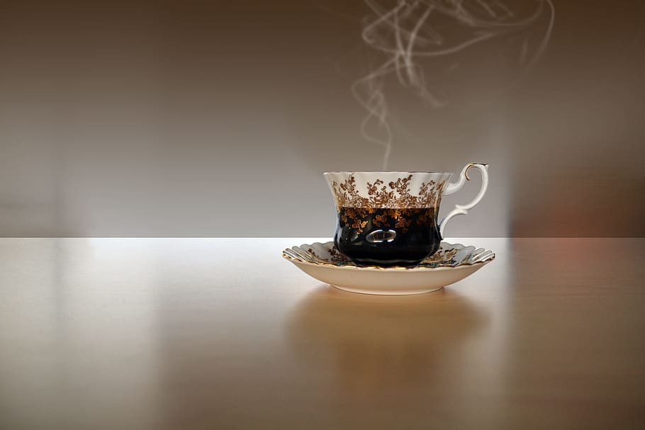 white-and-black ceramic teacup on saucer, cup of tea, drink, beverage