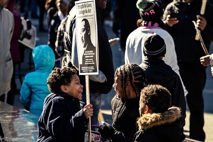 boy holding banner during daytime, sign, children, crowd, protest HD wallpaper