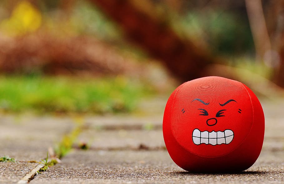red stress ball, smiley, rage, evil, sour, funny, sweet, cute