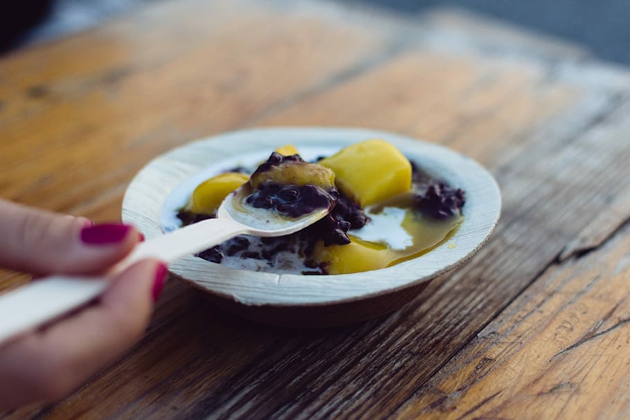 Indian black rice dessert, close up, hands, mango, sweet, food HD wallpaper
