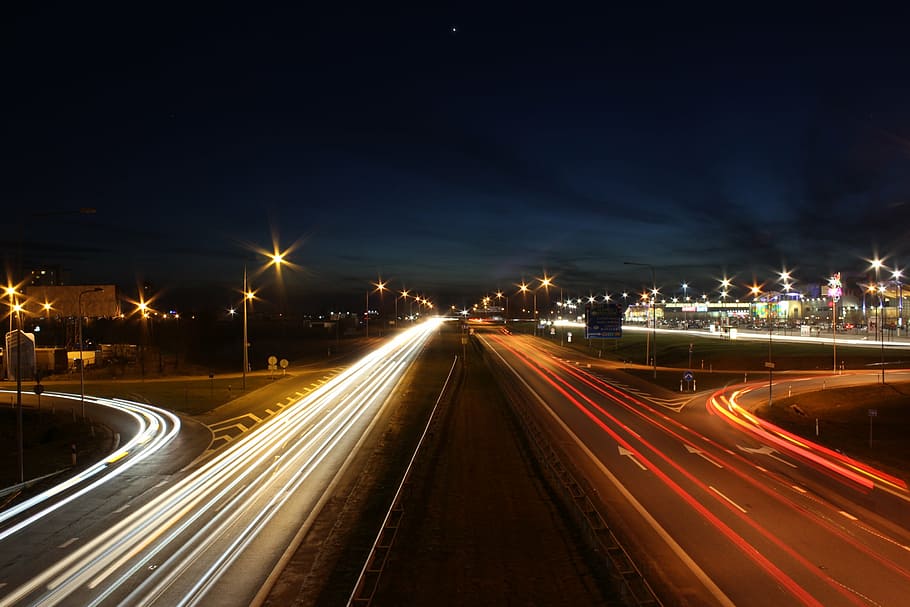 time-lapse photography of car lights on road, highway, speedway