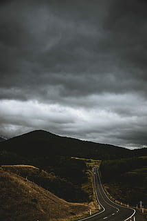 top view of gray roadway between hills, gray concrete road across mountains HD wallpaper