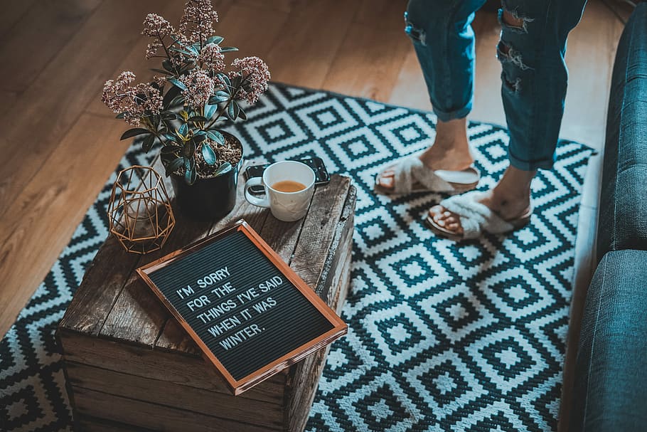 framed sorry quote on table beside half-filled mug, untitled HD wallpaper