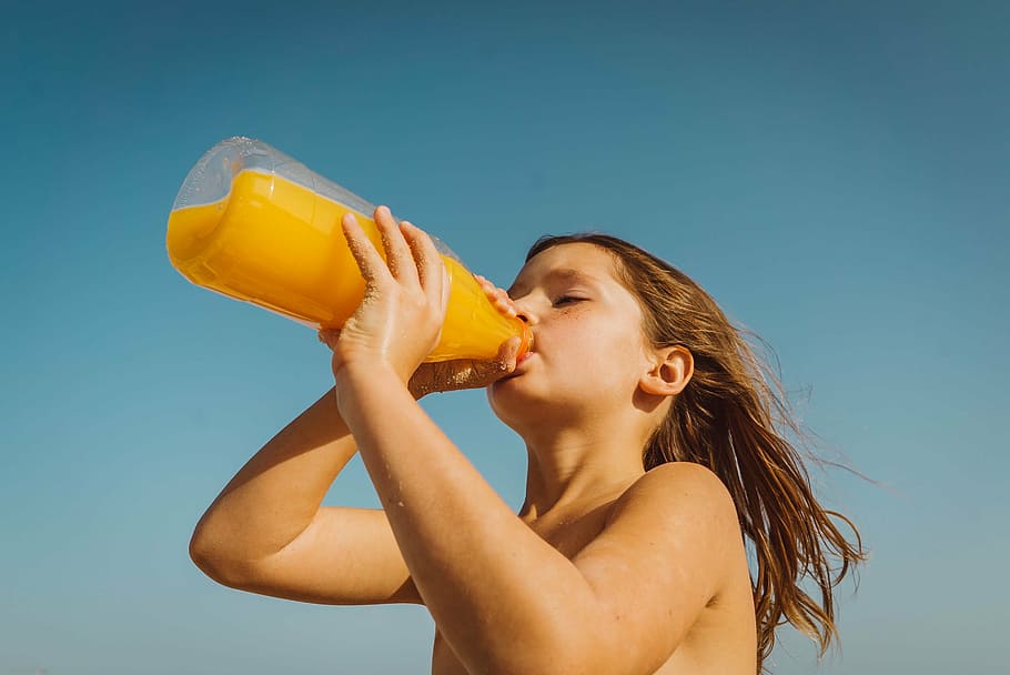 toddler' drinking juice on plastic bottle, people, girl, kid, HD wallpaper