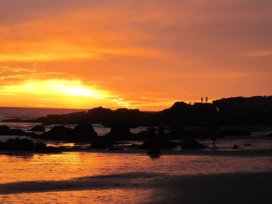 sunset, beach, rocks, cliffs, silhouettes, landscape, nature HD wallpaper