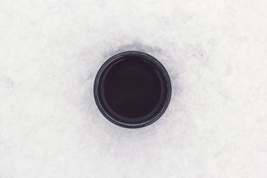 round black container on top of white surface, untitled, Beauty