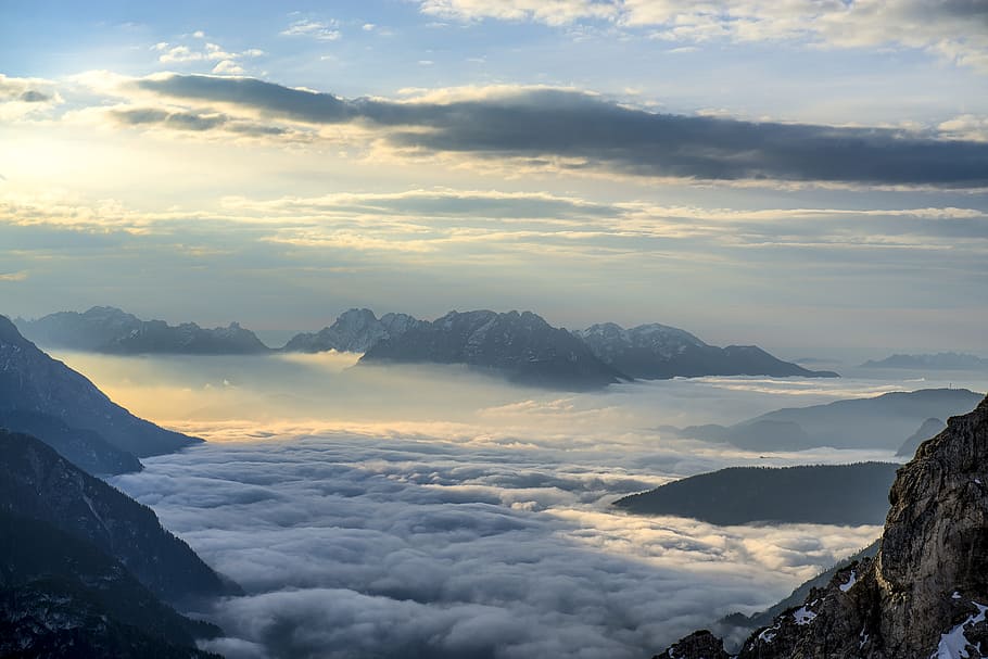 landscape photography of mountains surrounded with clouds, top view of mountain covered by clouds HD wallpaper