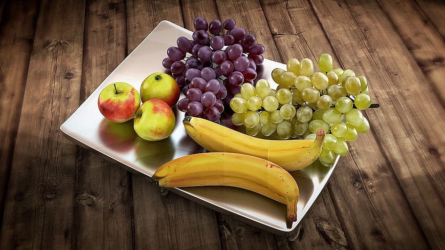 three green-and-red apples, two ride bananas and green-and-purple grapes on rectangular white ceramic plate, HD wallpaper