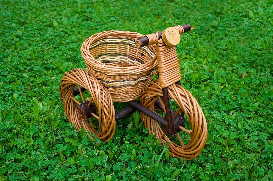 woven trike basket on grass field, wicker, bike, green, isolated