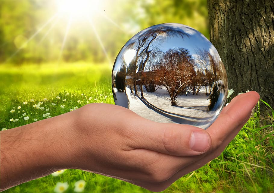 person holding crystal ball, winter, summer, contrast, seasons HD wallpaper