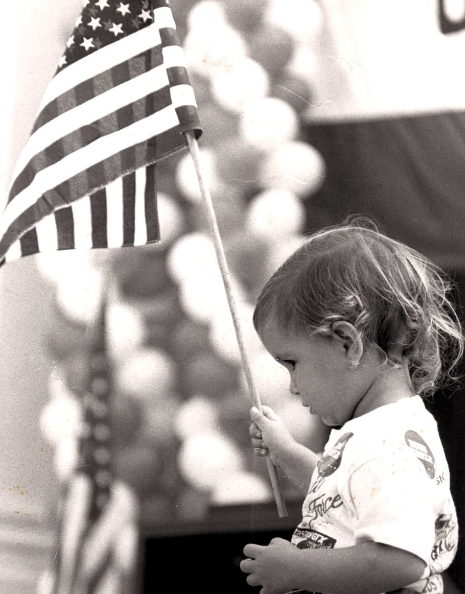 grayscale photo of toddler holding U.S.A. flag, election, rally, HD wallpaper