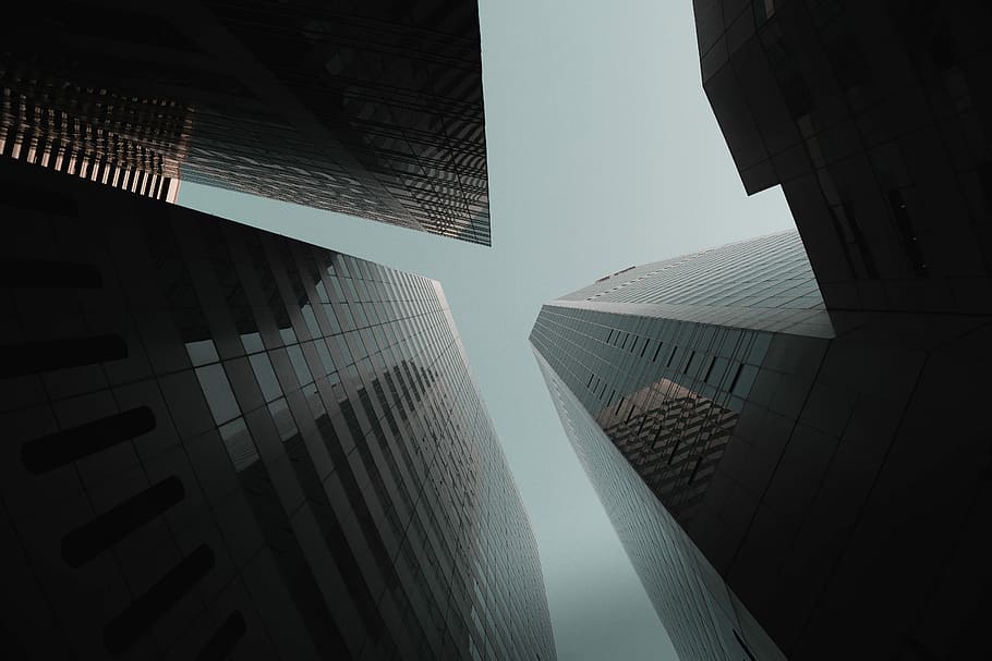 low angle photography of buildings at daytime, lowlight photography of high-rise buildings HD wallpaper