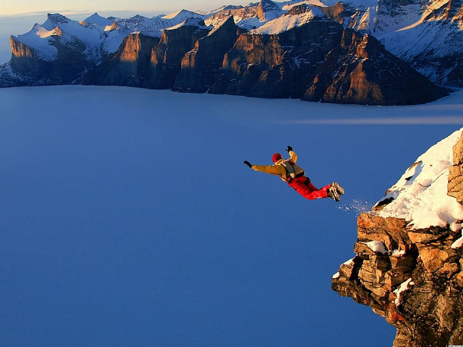 man jumping at cliff under golden hour, diving, leaping, ocean, HD wallpaper