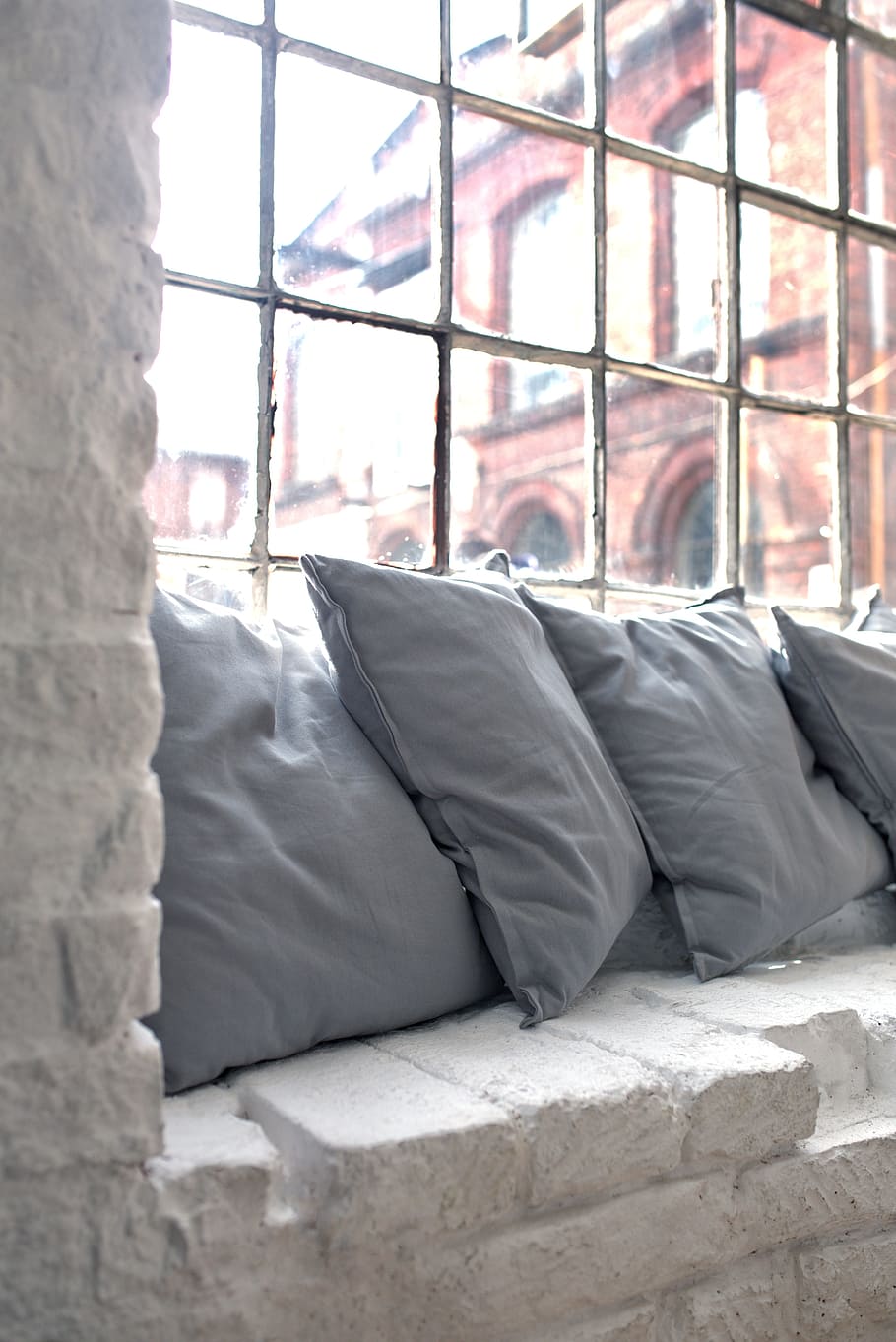 four gray throw pillows by the window, interior, design, brick HD wallpaper