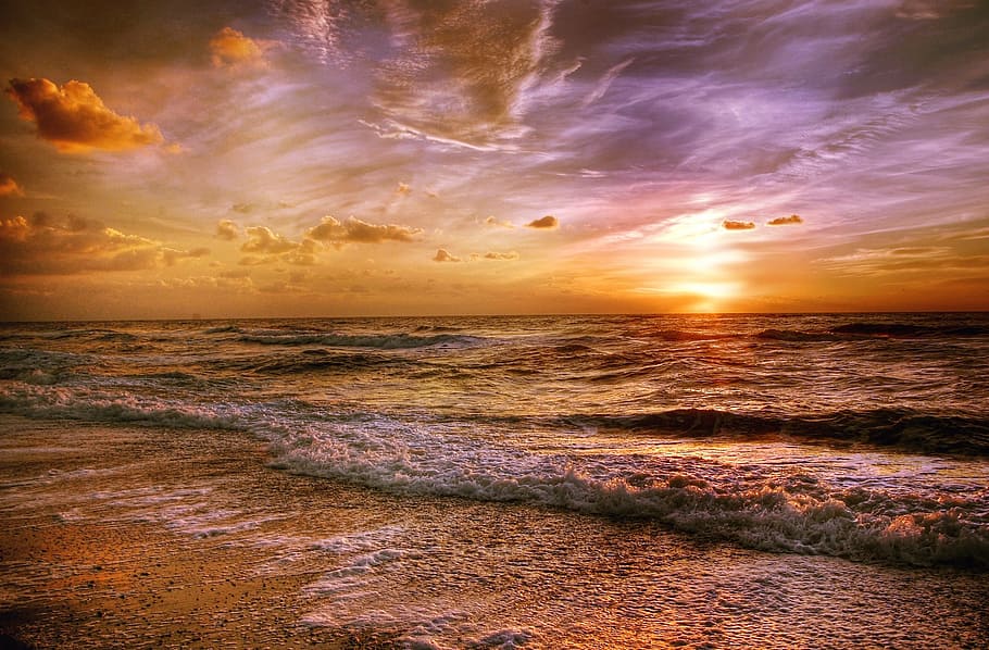 brown seashore and body of water waves under brown clouds and gray sky HD wallpaper