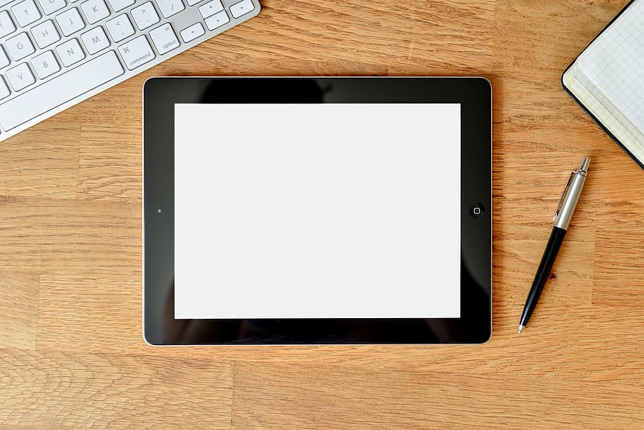 black iPad on top of brown wooden surface, tablet, computer HD wallpaper