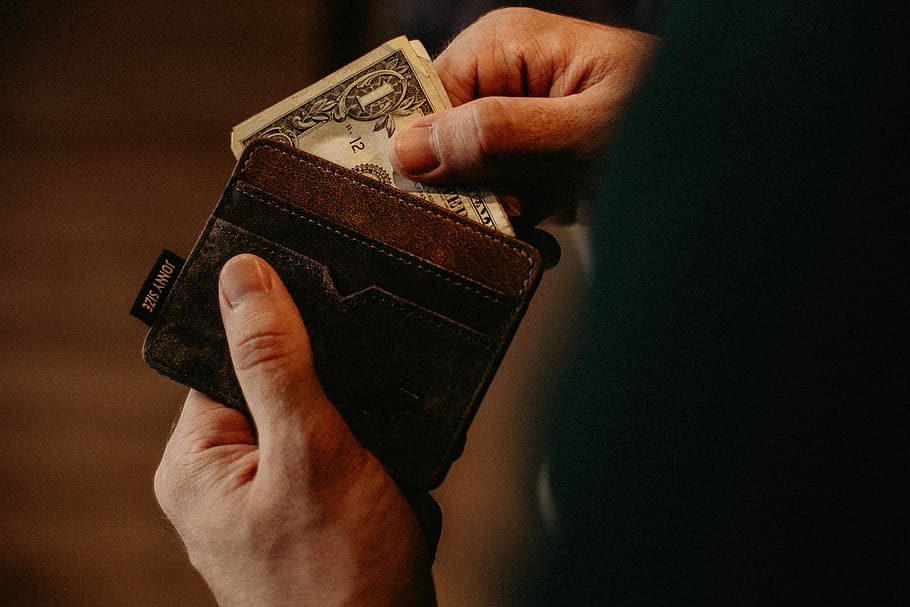person getting 1 U.S. dollar banknote in wallet, person holding wallet with 1 U.S. dollar banknote HD wallpaper