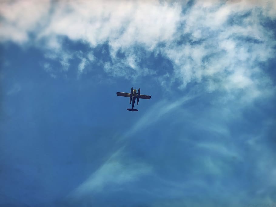 low-angle photo of plane flying under blue sky, floatplane HD wallpaper