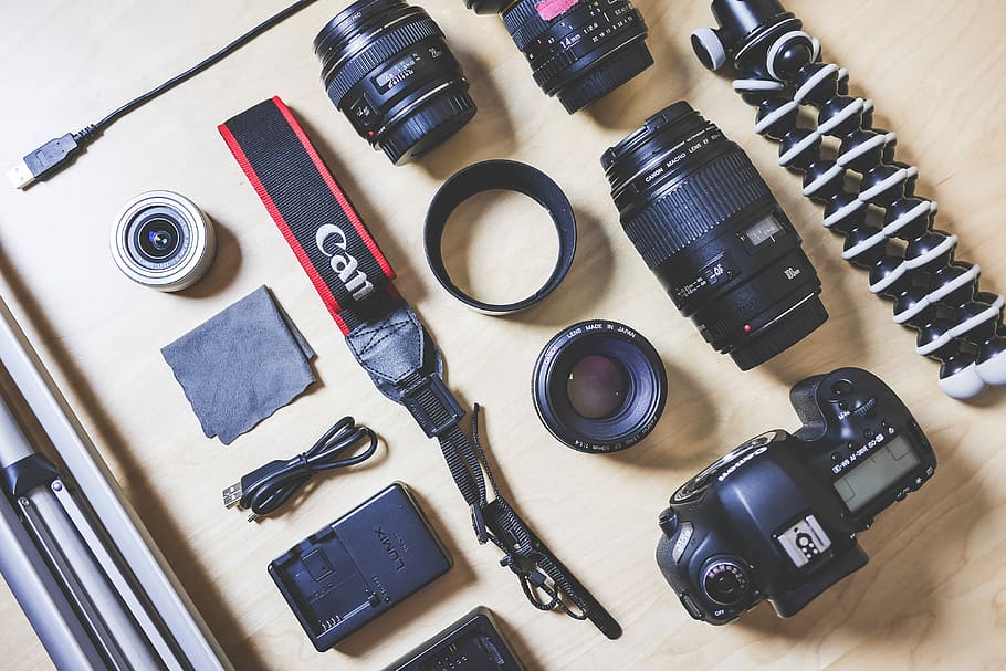 The Photographer’s DSLR Camera Equipment, cables, lenses, packing