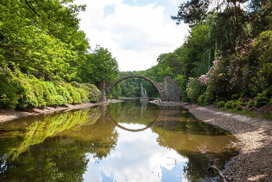 river above concrete arch surrounded by trees at daytime, stone arch HD wallpaper