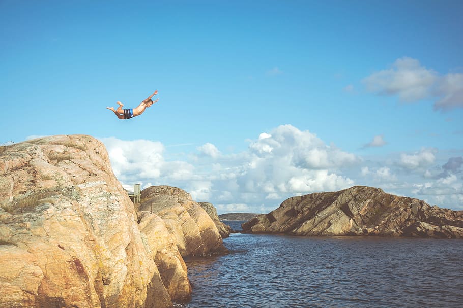 person diving in water, time lapse photography of man diving on beach HD wallpaper