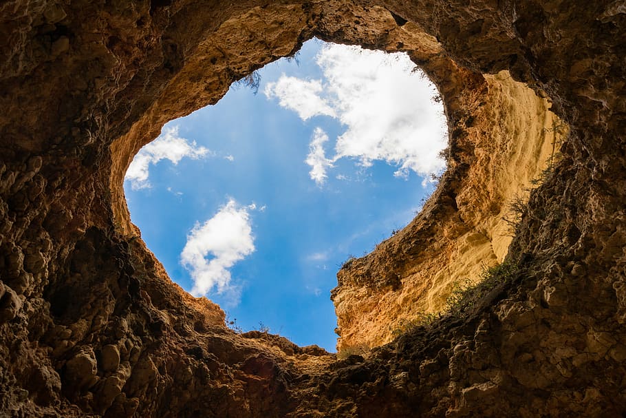 low angle photo of cave, rock, formation, brown, hole, white HD wallpaper