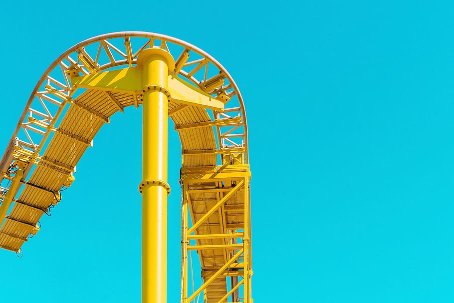 yellow roller coaster rail under clear sky, yellow metal roller coaster rail HD wallpaper