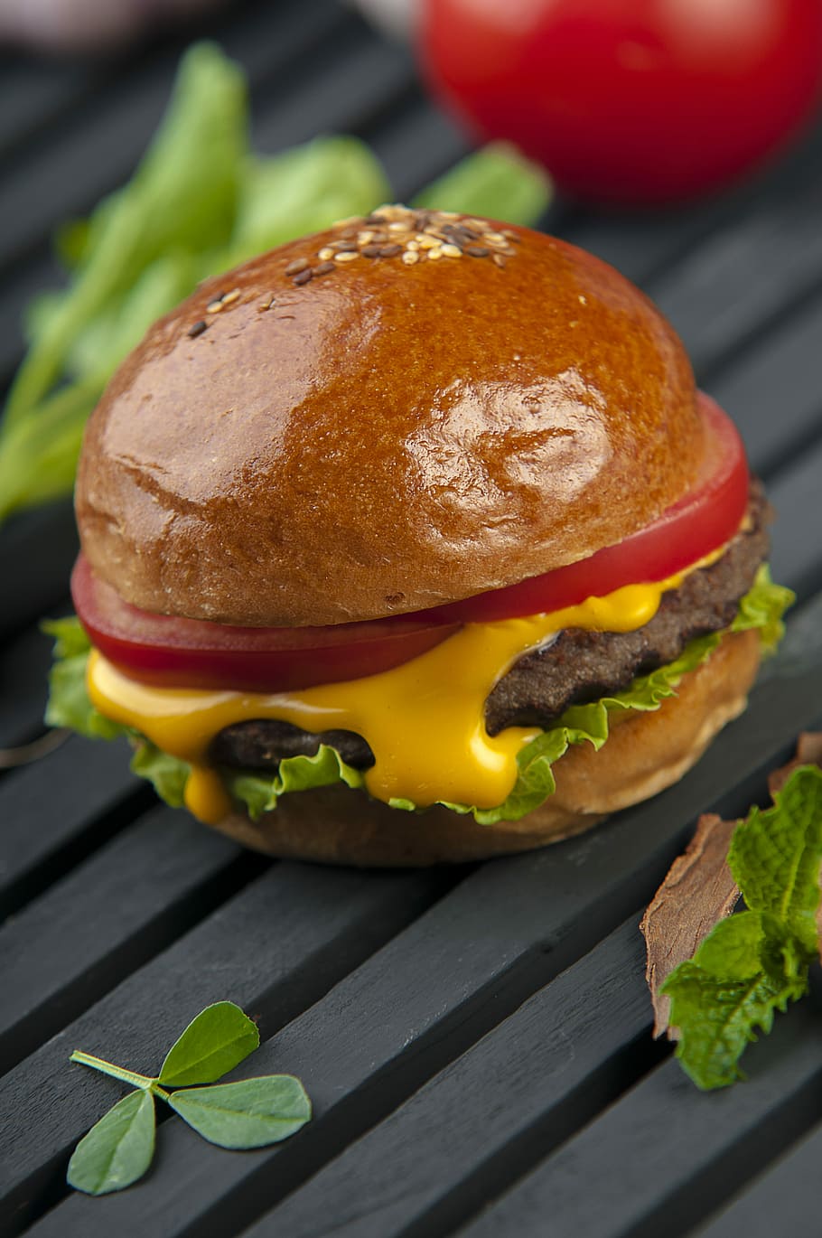 cheese burger on a wooden surface, shallow focus photography of hamburger HD wallpaper