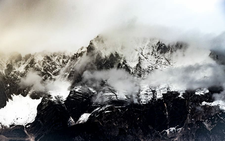 mountain ranges covered in snow and white fog, snow covered mountain grayscale photo HD wallpaper