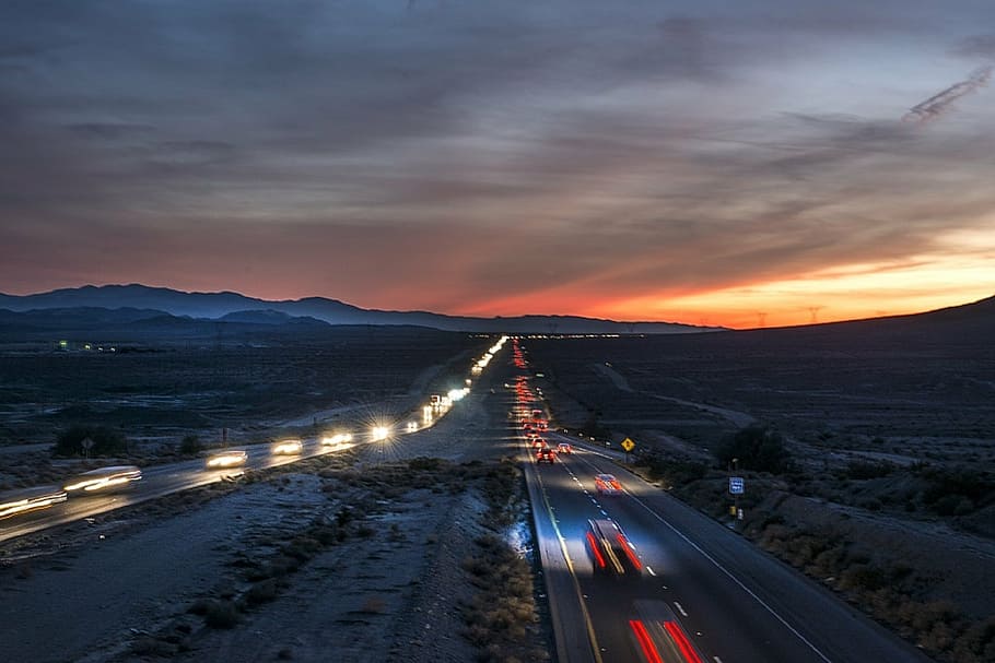 mountains, sunset, highway, traffic, landscape, road, travel HD wallpaper