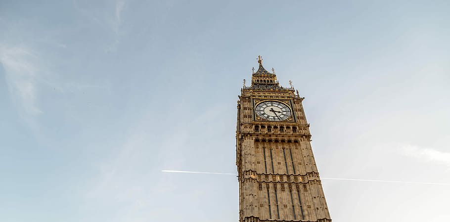 Big Ben under blue sky during daytime, low angle photography of Big Ben in London at daytime HD wallpaper
