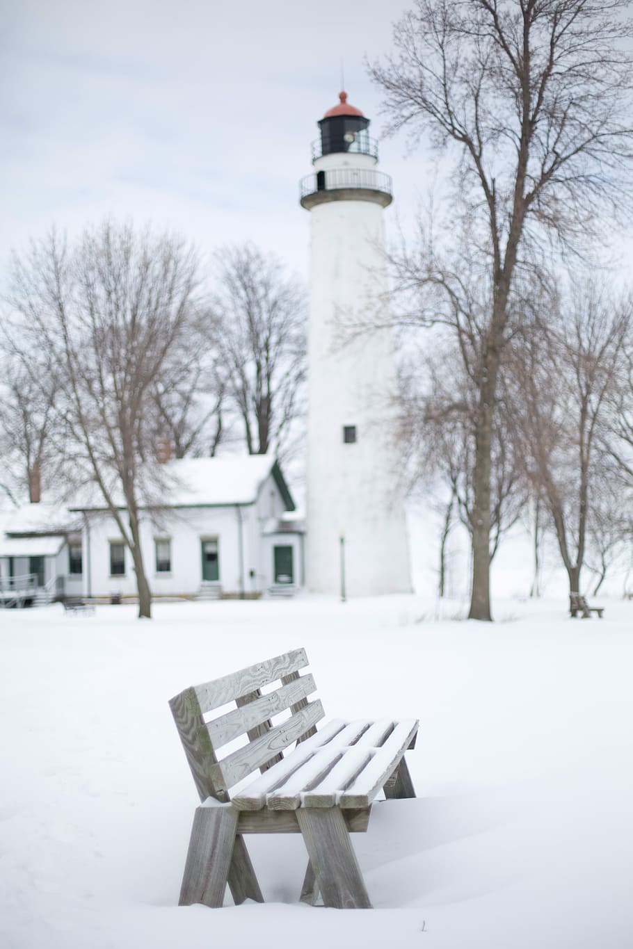 white lighthouse beside house and trees, Bench, Winter, Snowy HD wallpaper