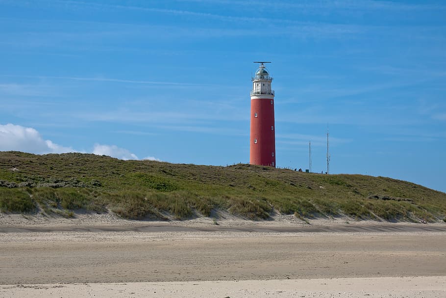 lighthouse, grass, dunes, wind, seafaring, texel, netherlands HD wallpaper