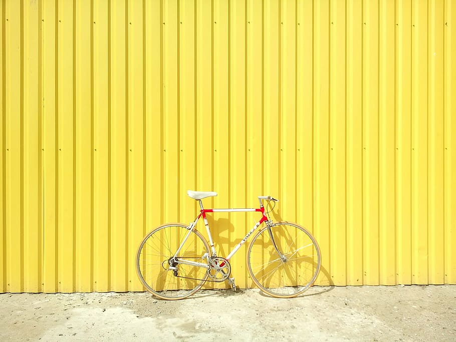 white and red road bike near yellow fence, cycle, bicycle, sport