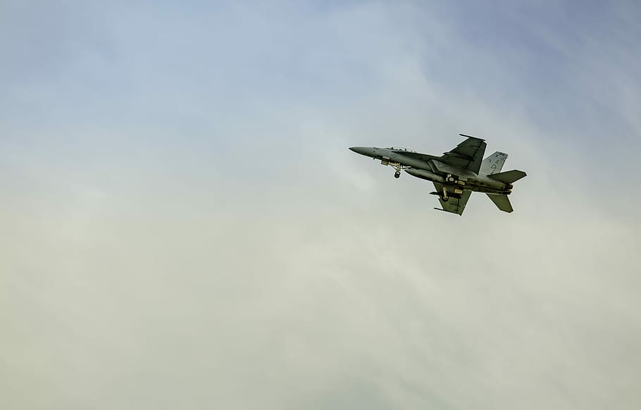 gray jet fighter flying through sky, fighter jet flying above clouds HD wallpaper