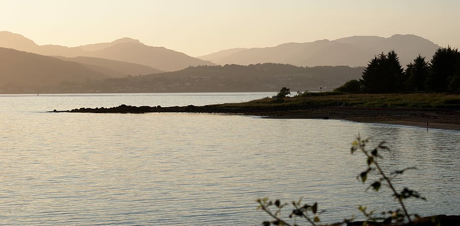 river, hills, mountains, dusk, rocks, beach, water, sky, nature HD wallpaper