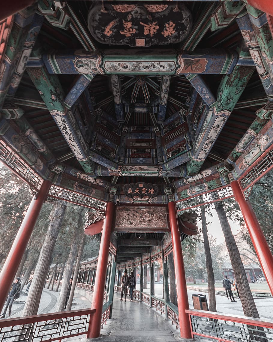 view of hallway temple, red and green wooden structure during daytime HD wallpaper