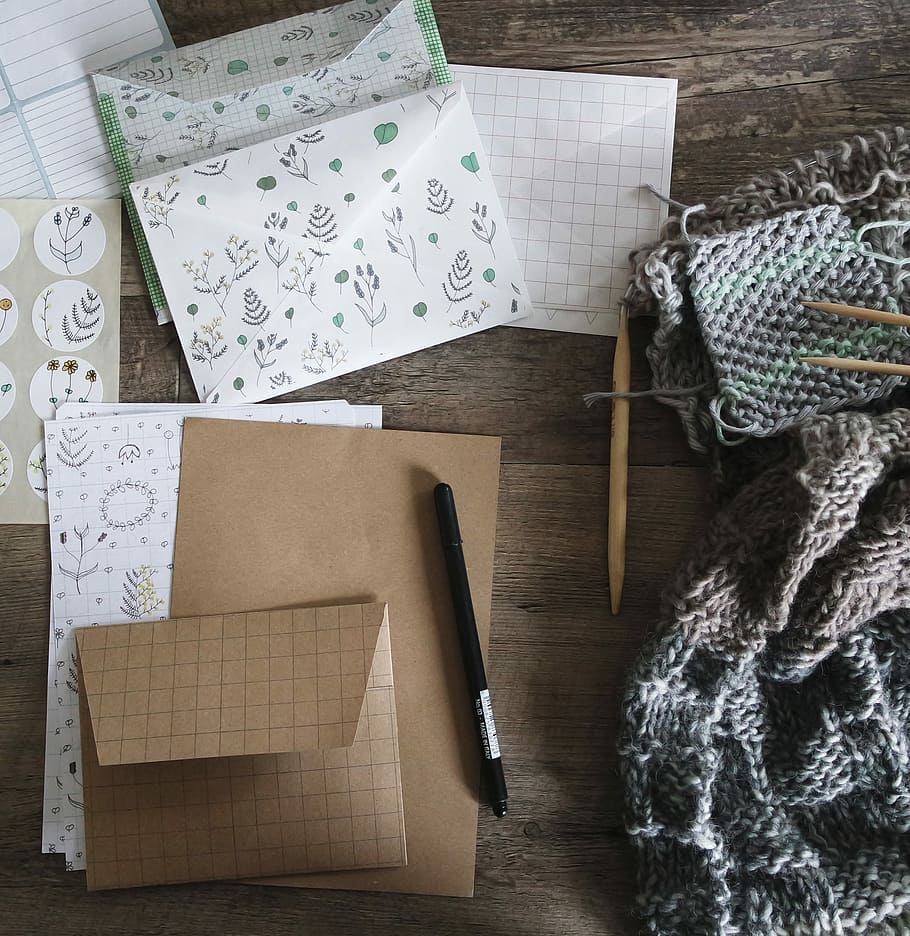 black pen beside envelop and knit scarf, brown box, paper, letter HD wallpaper
