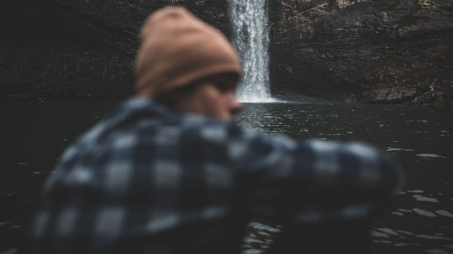 Thinking, waterfalls behind a man wearing black and white dress shirt HD wallpaper