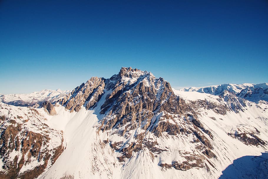 brown mountain covered with snow at daytime, brown mountain covered by snow at daytime HD wallpaper