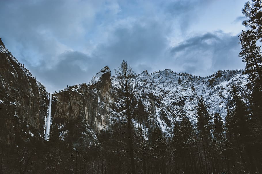 green pine trees, white and black glacier mountain, cliff, waterfall HD wallpaper