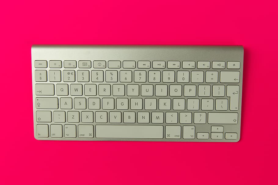 Apple wireless keyboard on pink background, technology, business, HD wallpaper