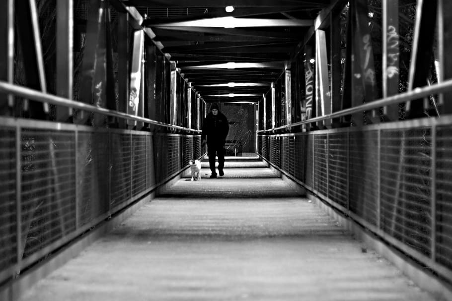 grayscale photo of man walking on hallway, white, black, passage HD wallpaper