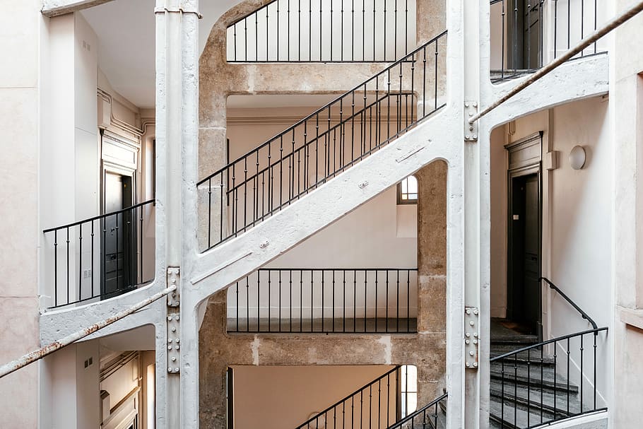 white concrete staircase with black steel handrails, empty staircase with black metal railings HD wallpaper