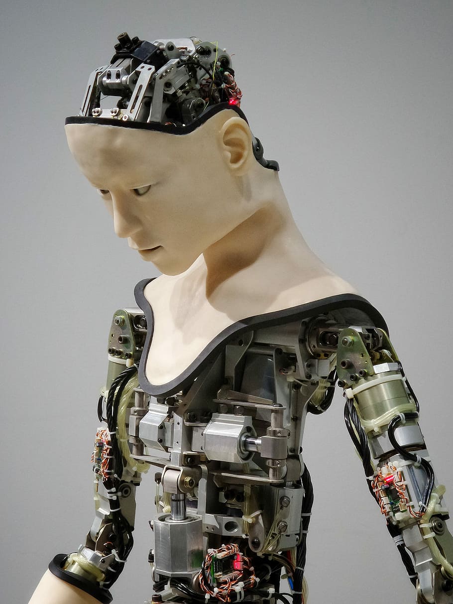 white and brown human robot illustration, selective focus photography of gray and beige robot HD wallpaper