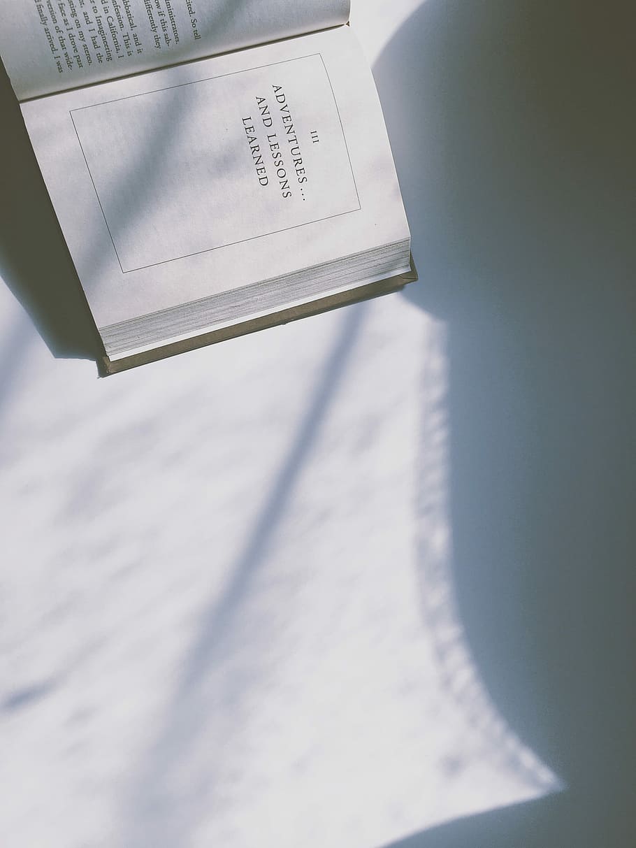 III Adventures and lessons learned text on open book page, opened white book HD wallpaper