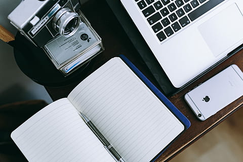 Elegant workspace with Macbook, iPhone, business cards and notebooks HD wallpaper